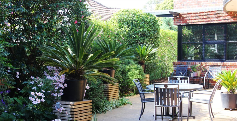 Art Deco Garden design Melbourne, matching piers with highlighted focal planting. Garden Makeover