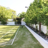 Rejuvenated tennis court and feature planting.